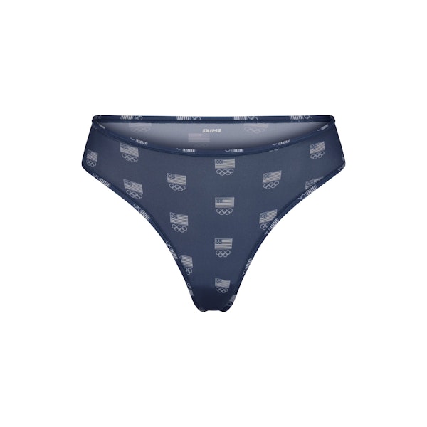 SKIMS FOR TEAM USA FITS EVERYBODY OLYMPIC DIPPED FRONT THONG | NAVY (THONGS, PANTIES) FLAT ON A WHITE BACKGROUND | FLT