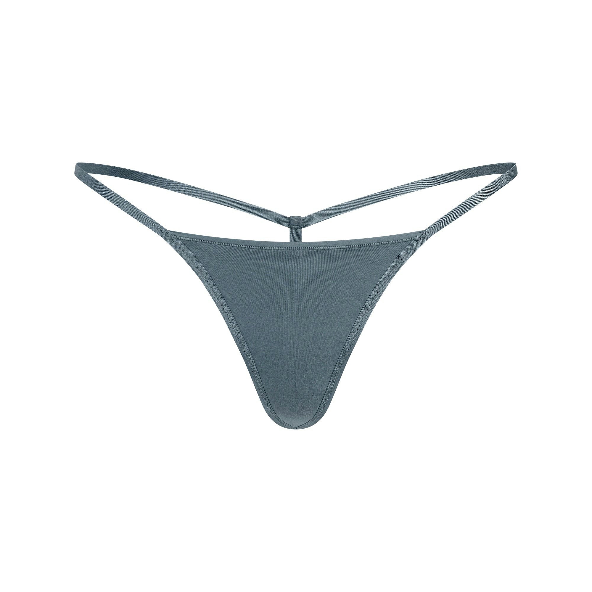 FITS EVERYBODY T-STRING THONG | ZIRCON FLAT ON A WHITE BACKGROUND | FLT