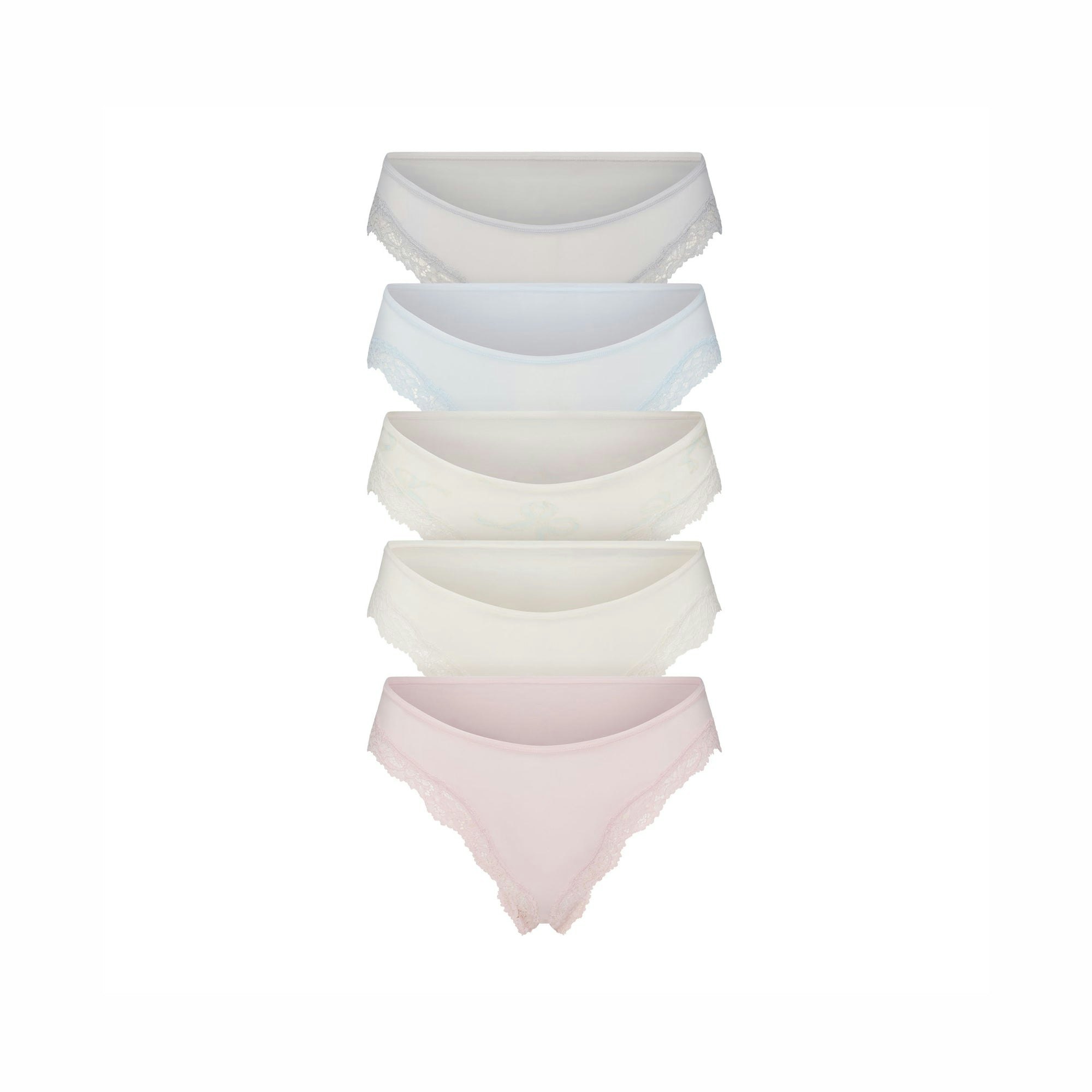 FITS EVERYBODY LACE CHEEKY TANGA 5-PACK | IVORY PEARL BOW MULTI LAYS FLAT ON A WHITE BACKGROUND | @ | FOCUS: 0.0, 1.0, 0.9 