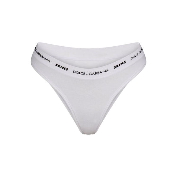 DOLCE&GABBANA X SKIMS COTTON JERSEY CHEEKY TANGA | SNOW (TANGAS) FLAT ON A WHITE BACKGROUND | FLT