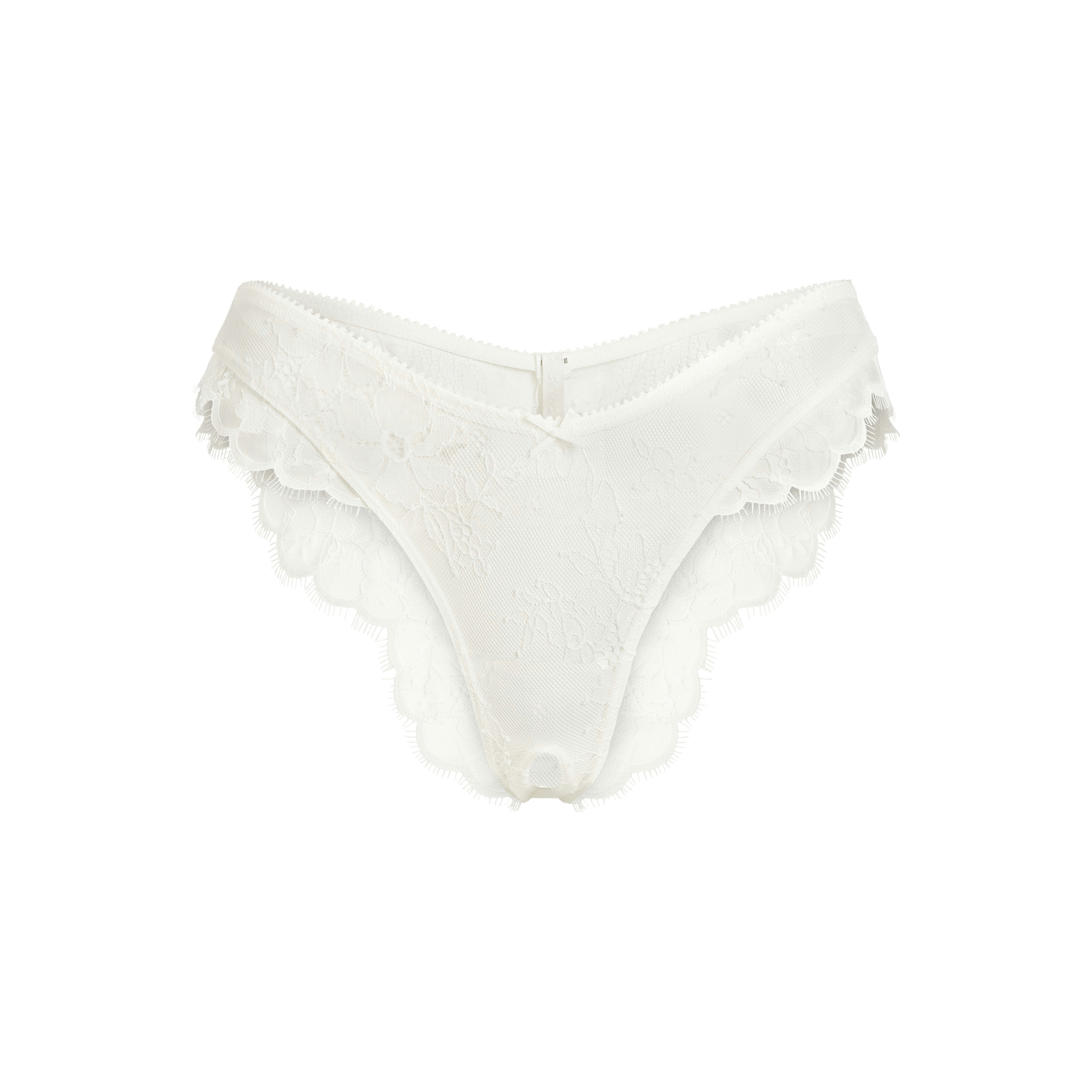 ULTRA FINE LACE CROTCHLESS TANGA | MARBLE FLAT ON A WHITE BACKGROUND | FLT