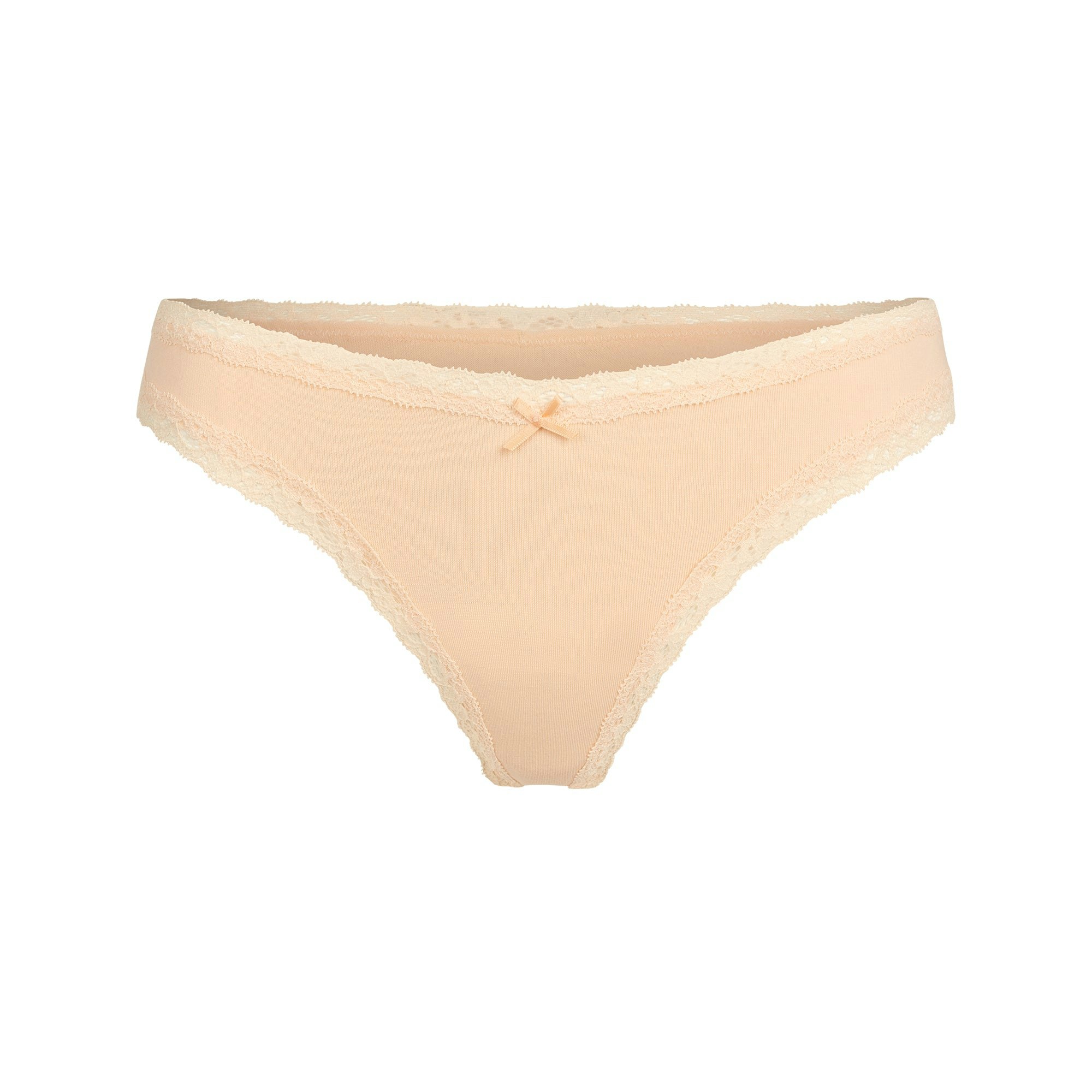 LIGHTWEIGHT COTTON LACE THONG | PEACH FLAT ON A WHITE BACKGROUND | FLT