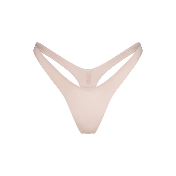 SHINE FOUNDATIONS DIPPED THONG | DUSTY PINK FLAT ON A WHITE BACKGROUND | FLT