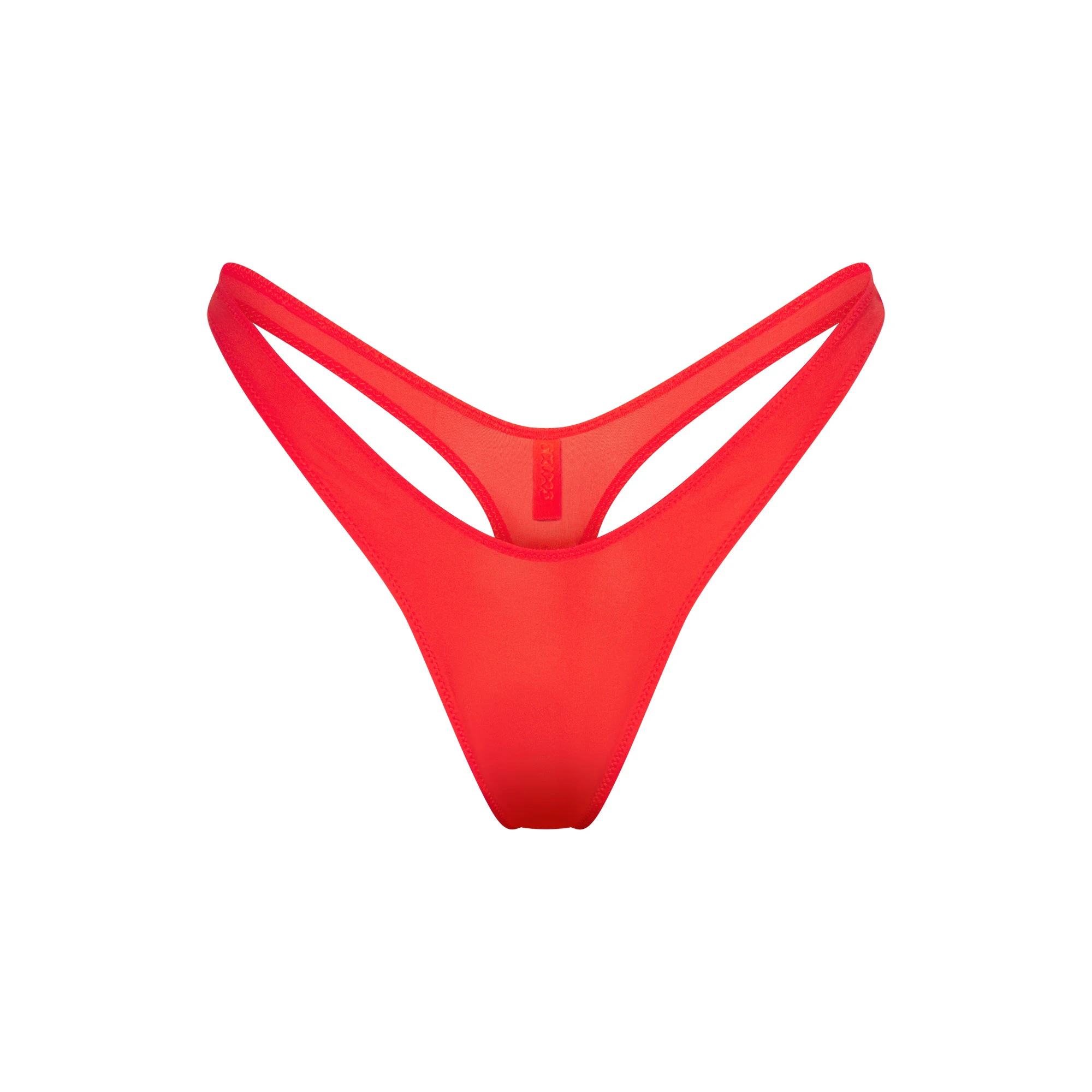 SHINE FOUNDATIONS DIPPED THONG | POPPY FLAT ON A WHITE BACKGROUND | FLT