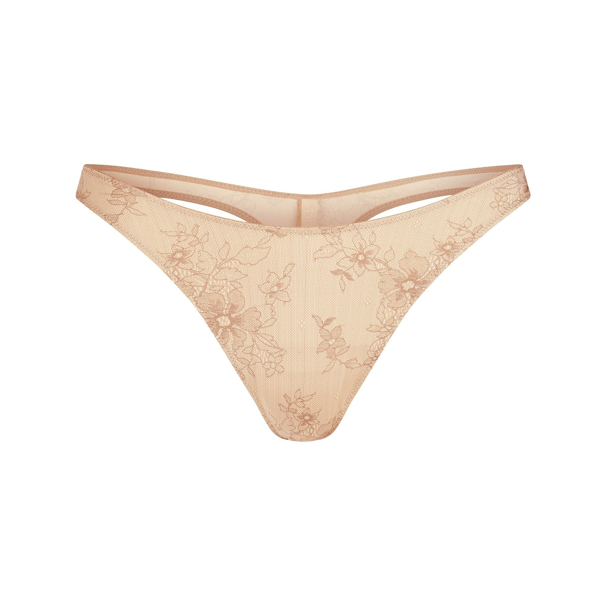 SHINE FOUNDATIONS DIPPED THONG | SAND LACE PRINT FLAT ON A WHITE BACKGROUND | FLT
