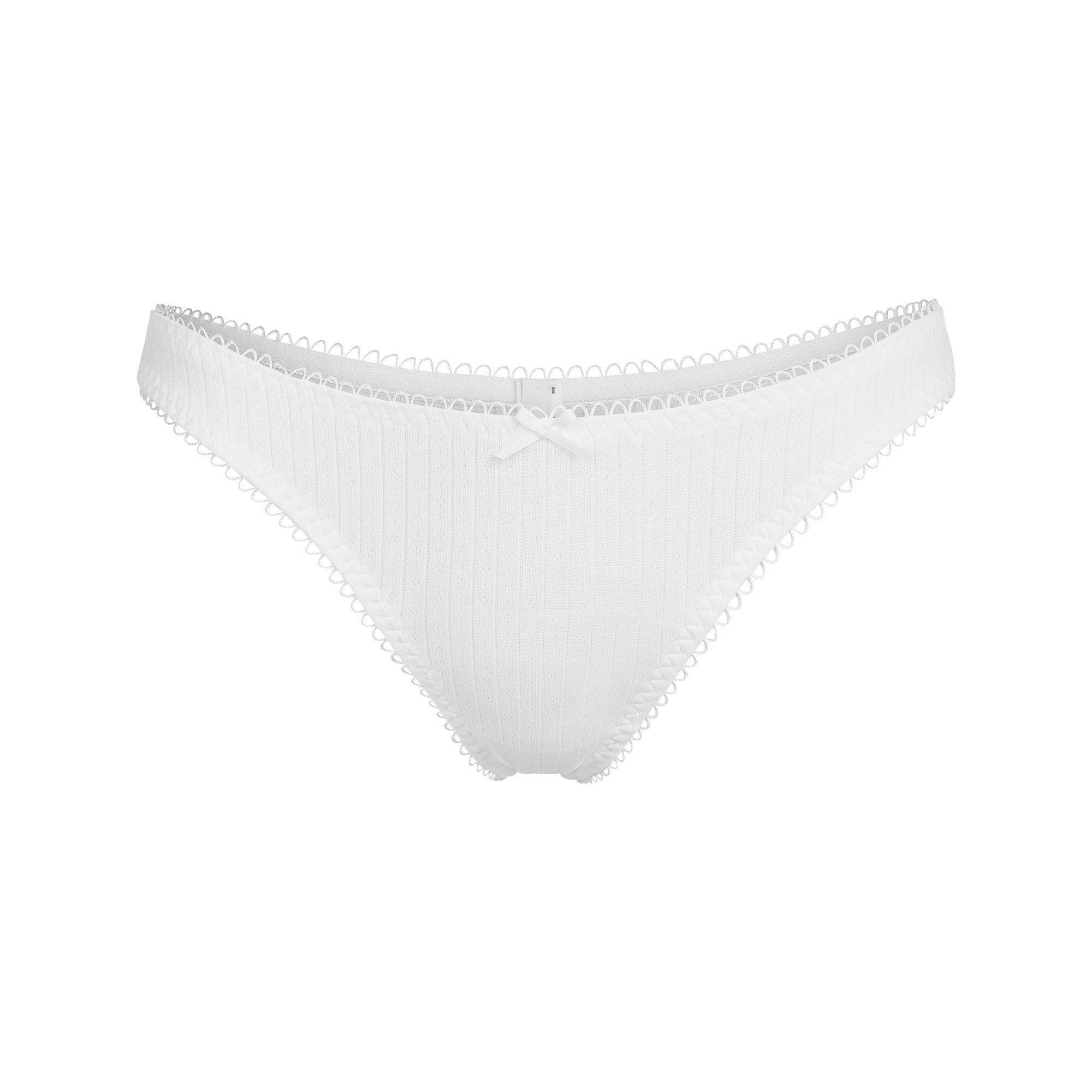 POINTELLE DIPPED THONG | SNOW FLAT ON A WHITE BACKGROUND | FLT
