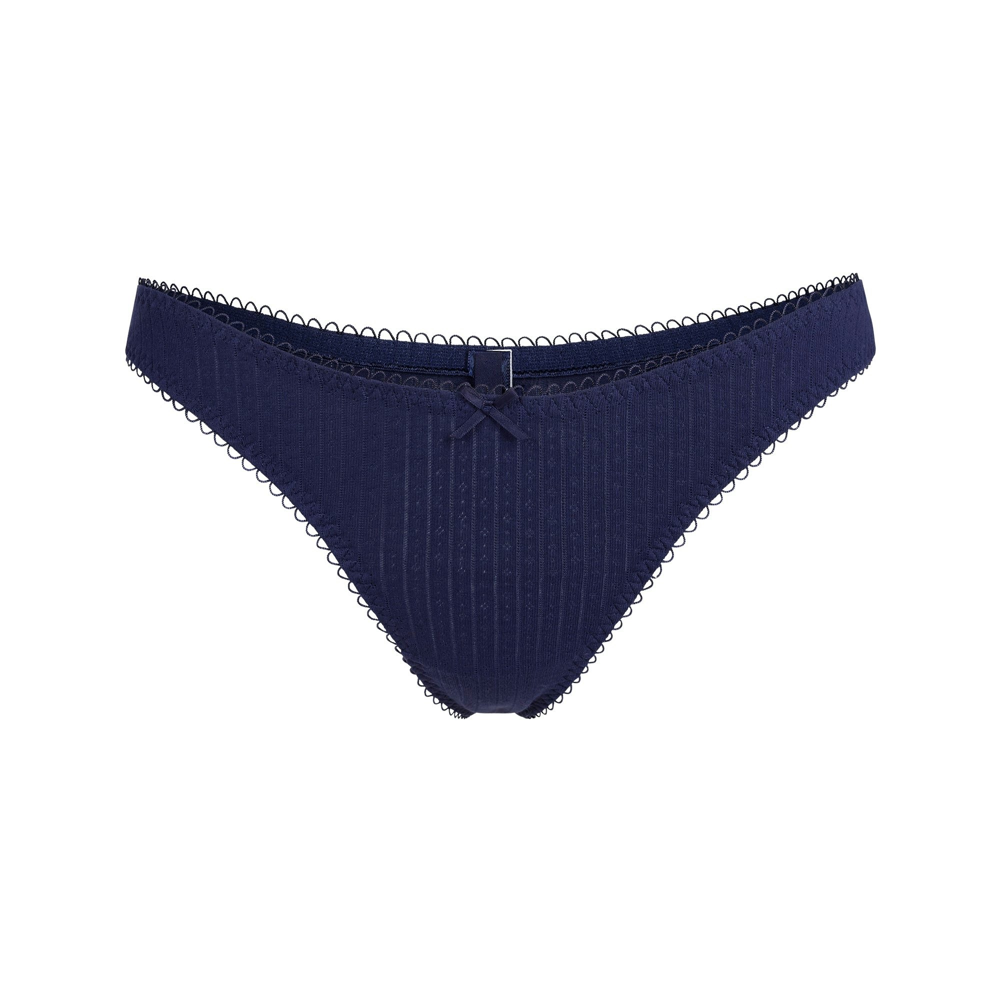 POINTELLE DIPPED THONG | WILDFLOWER FLAT ON A WHITE BACKGROUND | FLT