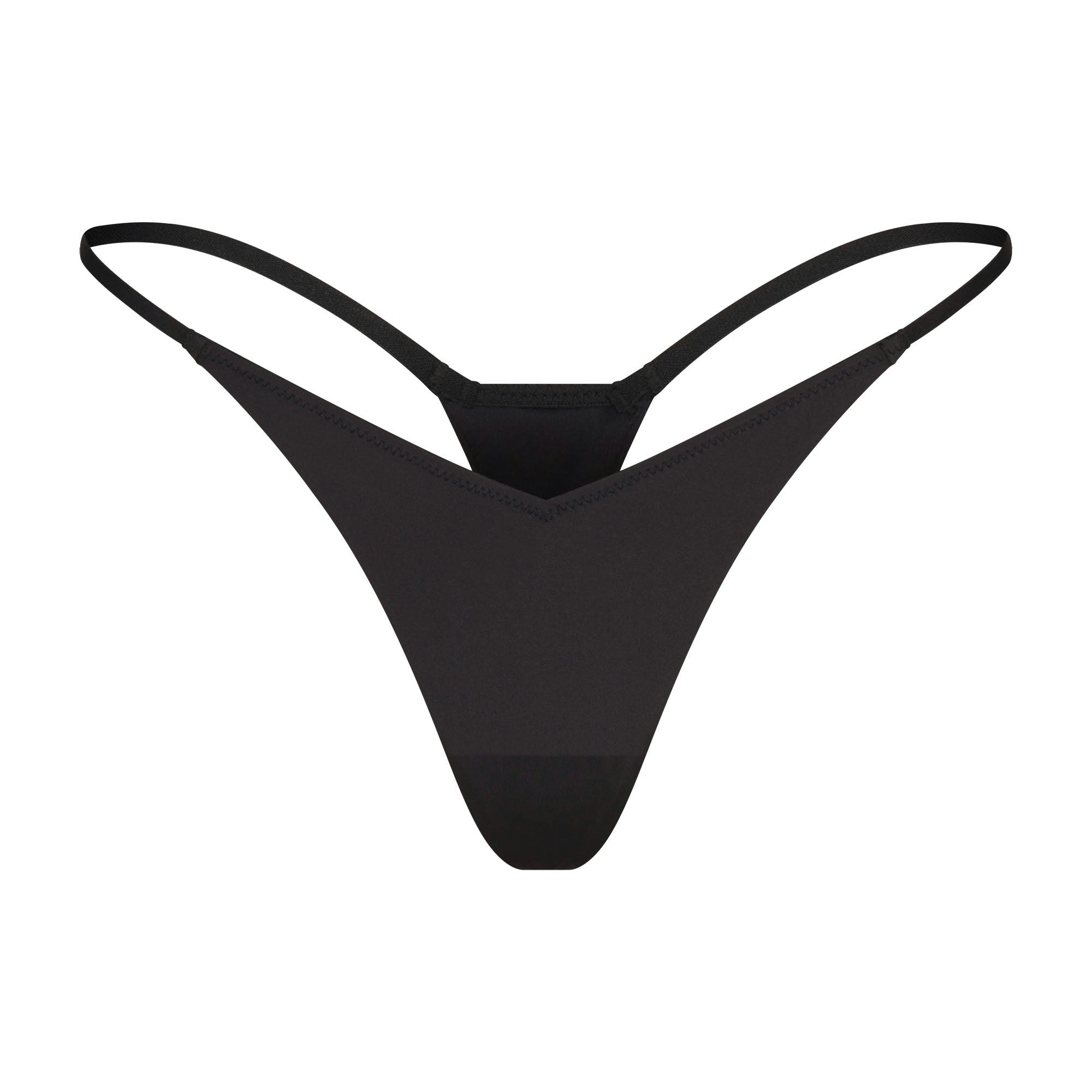 SHINE FOUNDATIONS DEEP V FRONT STRING THONG | ONYX FLAT ON A WHITE BACKGROUND | FLT