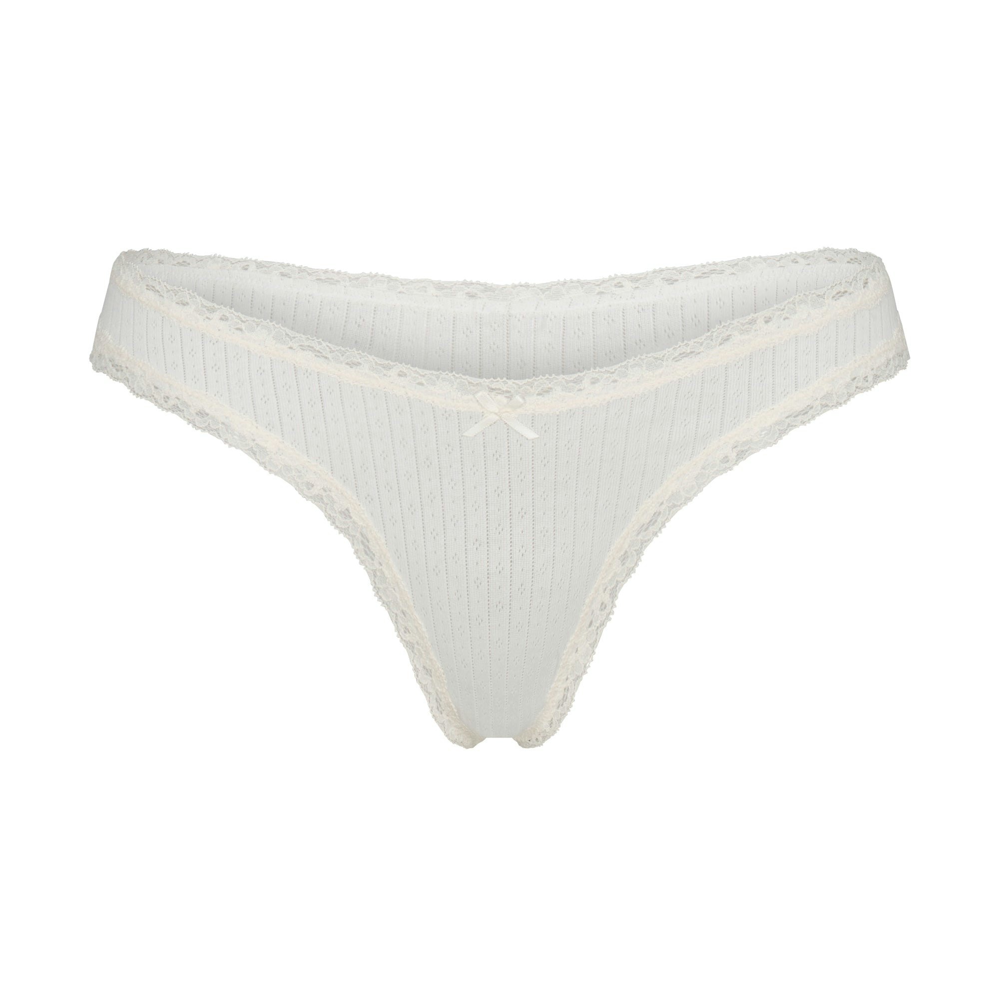 LIGHTWEIGHT COTTON POINTELLE LACE THONG | MARBLE TONAL FLAT ON A WHITE BACKGROUND | FLT