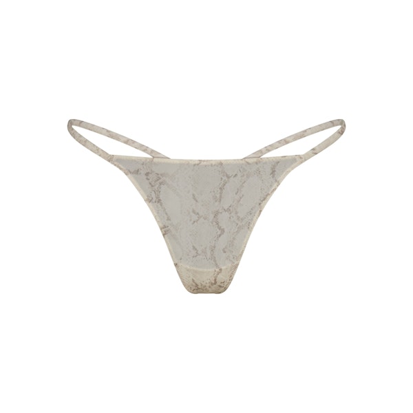 MILKY SHEER STRING THONG | STONE PASTEL SNAKE PRINT FLAT ON A WHITE BACKGROUND | FLT