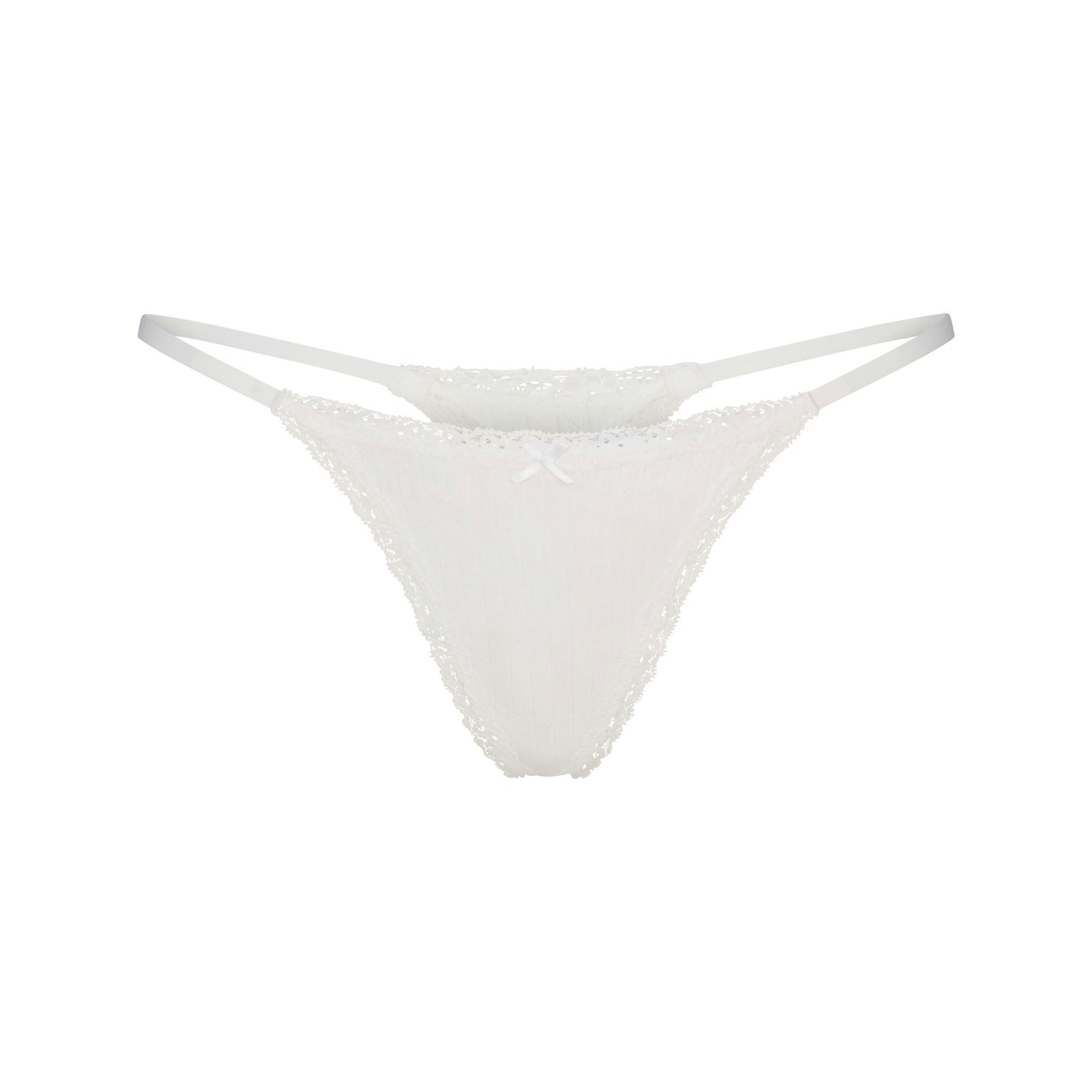 LIGHTWEIGHT COTTON POINTELLE LACE STRING THONG | SNOW FLAT ON A WHITE BACKGROUND | FLT