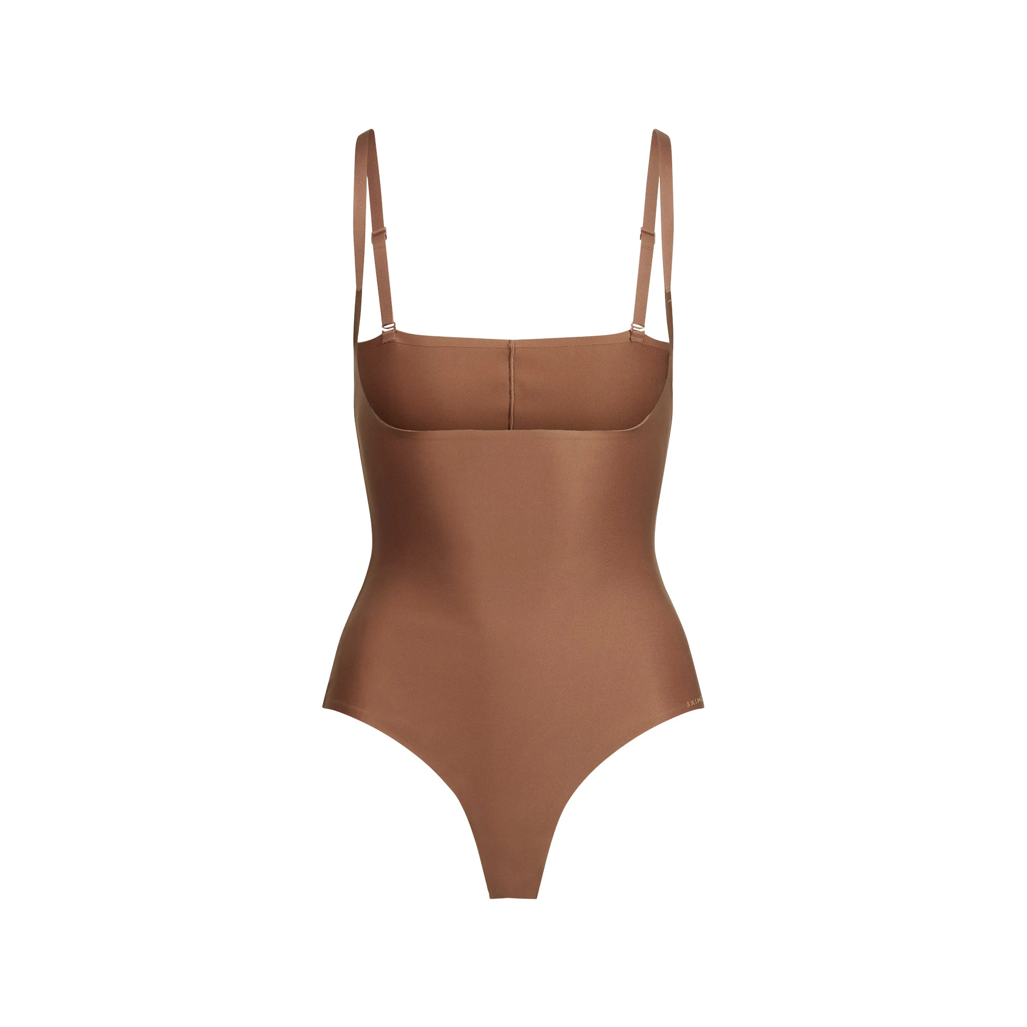 SKIMS BODY CORE SCULPT OPEN BUST THONG BODYSUIT | JASPER FLAT ON A WHITE BACKGROUND | FLT