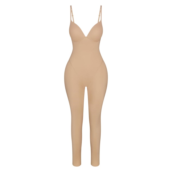 SKIMS ULTIMATE BODY BUTT AND HIP ENHANCING CATSUIT | CLAY FLAT ON A WHITE BACKGROUND | FLT