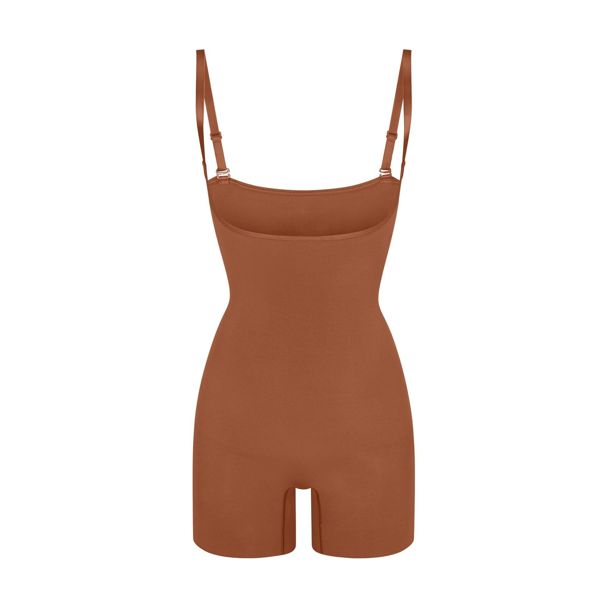SEAMLESS SCULPT OPEN BUST SHORTIE BODYSUIT | BRONZE (ONESIES, BODYSUITS) LAYS FLAT ON A WHITE BACKGROUND | FLT