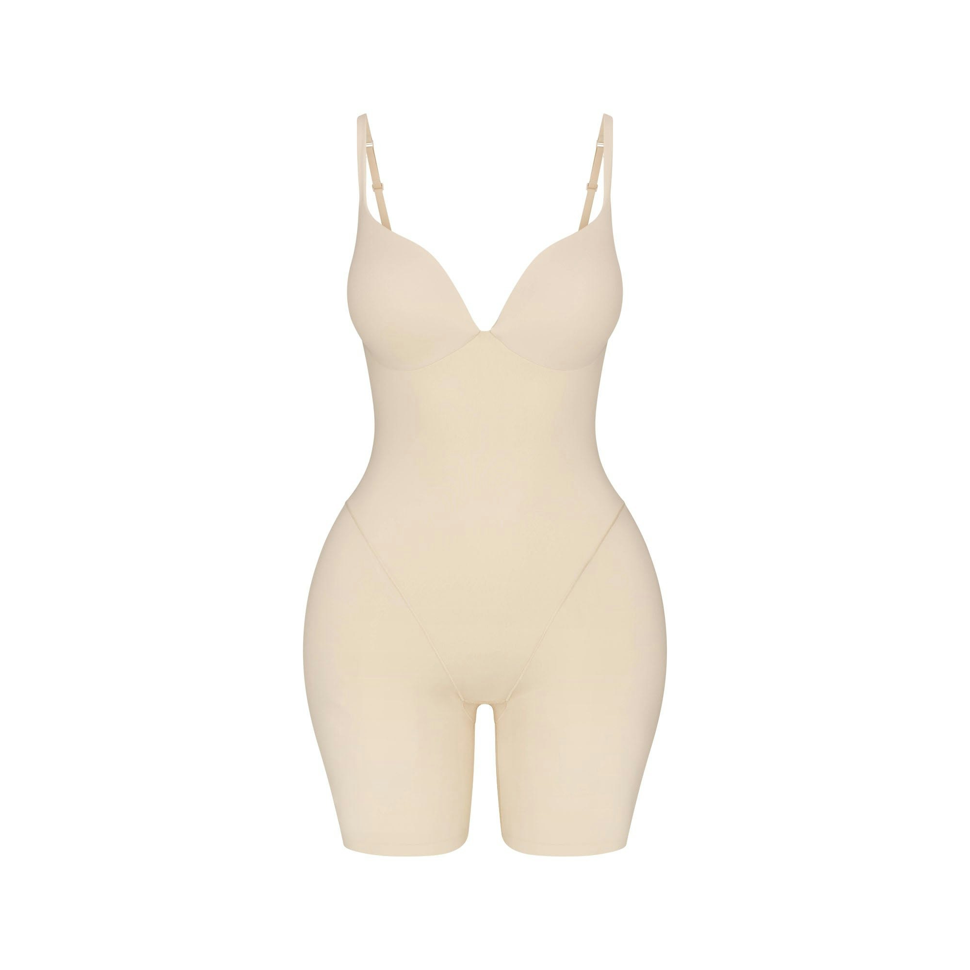 SKIMS ULTIMATE BODY BUTT AND HIP ENHANCING MID THIGH BODYSUIT | SAND FLAT ON A WHITE BACKGROUND | FLT