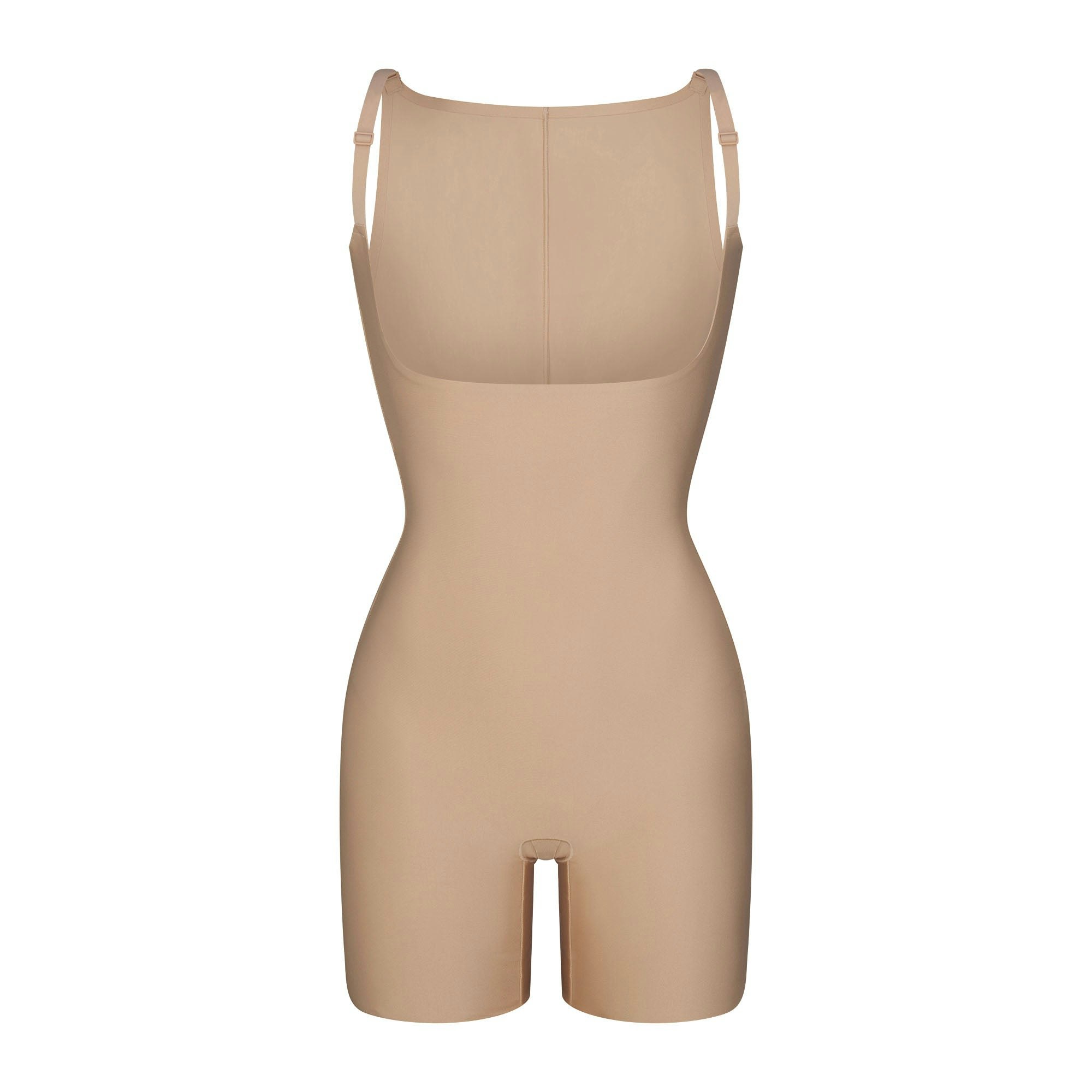 SKIMS BODY CORE SCULPT BACK SMOOTHING OPEN BUST MID THIGH BODYSUIT | CLAY FLAT ON A WHITE BACKGROUND | FLT