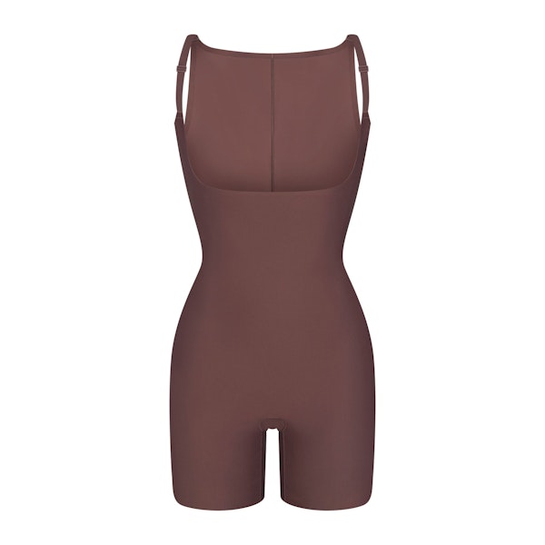 SKIMS BODY CORE SCULPT BACK SMOOTHING OPEN BUST MID THIGH BODYSUIT | COCOA FLAT ON A WHITE BACKGROUND | FLT