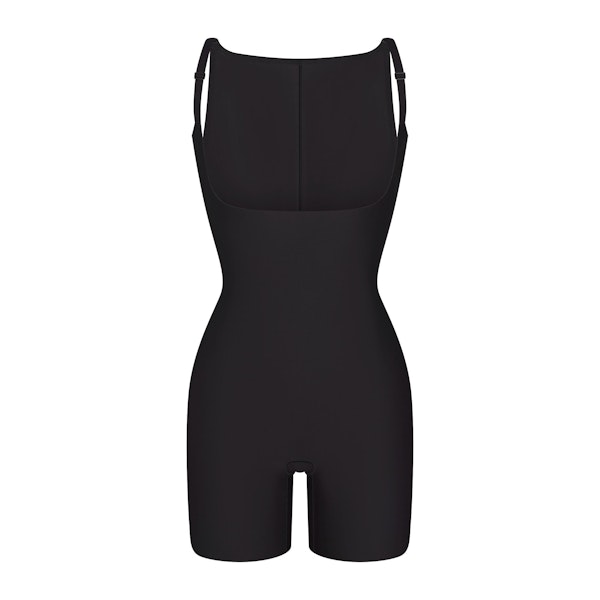 SKIMS BODY CORE SCULPT BACK SMOOTHING OPEN BUST MID THIGH BODYSUIT | ONYX FLAT ON A WHITE BACKGROUND | FLT