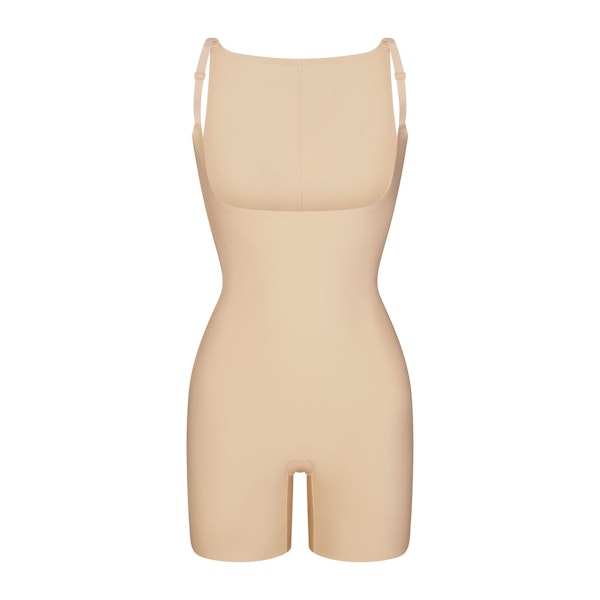 SKIMS BODY CORE SCULPT BACK SMOOTHING OPEN BUST MID THIGH BODYSUIT | SAND FLAT ON A WHITE BACKGROUND | FLT