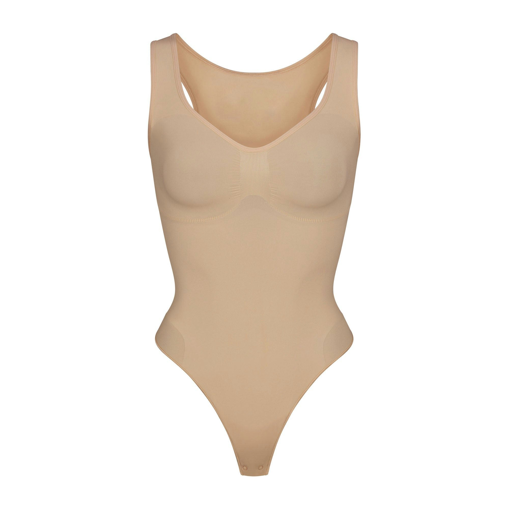 SEAMLESS SCULPT SCOOP NECK THONG BODYSUIT | CLAY (SHAPEWEAR BODYSUITS) LAYS FLAT ON A WHITE BACKGROUND | FLT