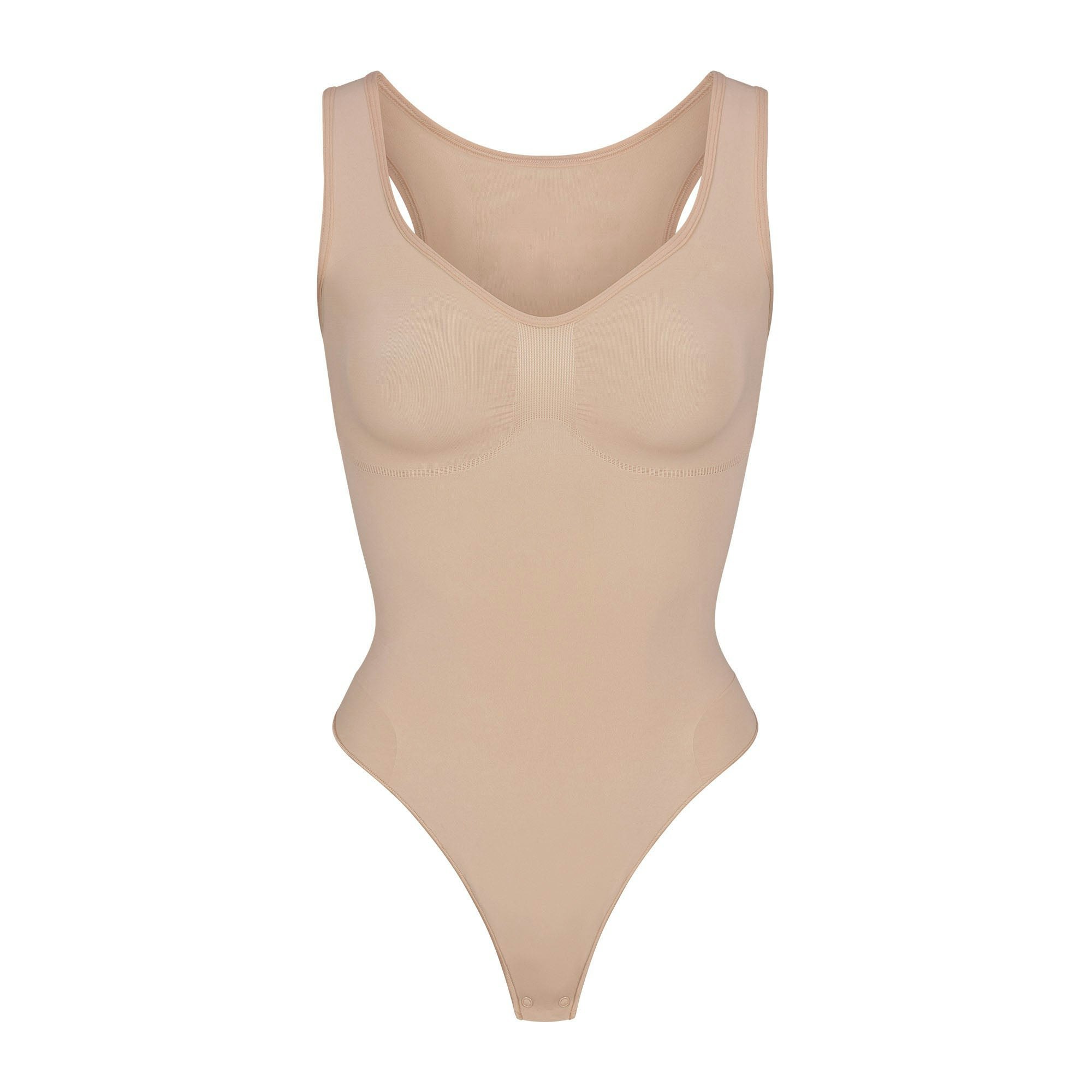 SEAMLESS SCULPT SCOOP NECK THONG BODYSUIT | MICA (SHAPEWEAR BODYSUITS) LAYS FLAT ON A WHITE BACKGROUND | FLT