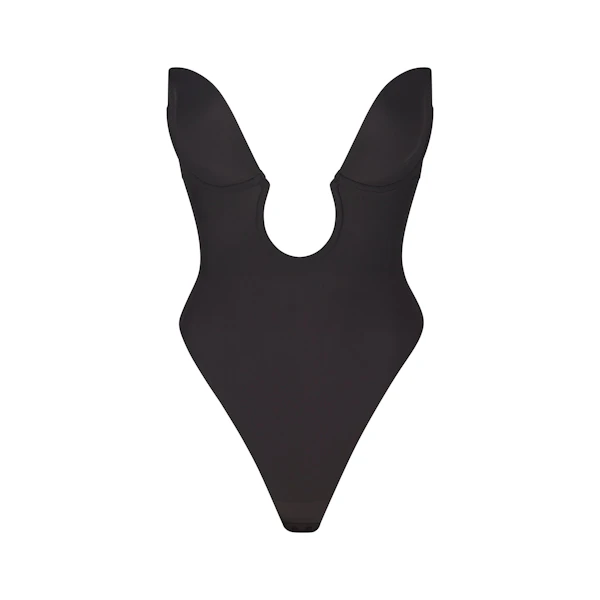 DEEP PLUNGE SHAPEWEAR BODYSUIT LAYS FLAT ON A WHITE BACKGROUND