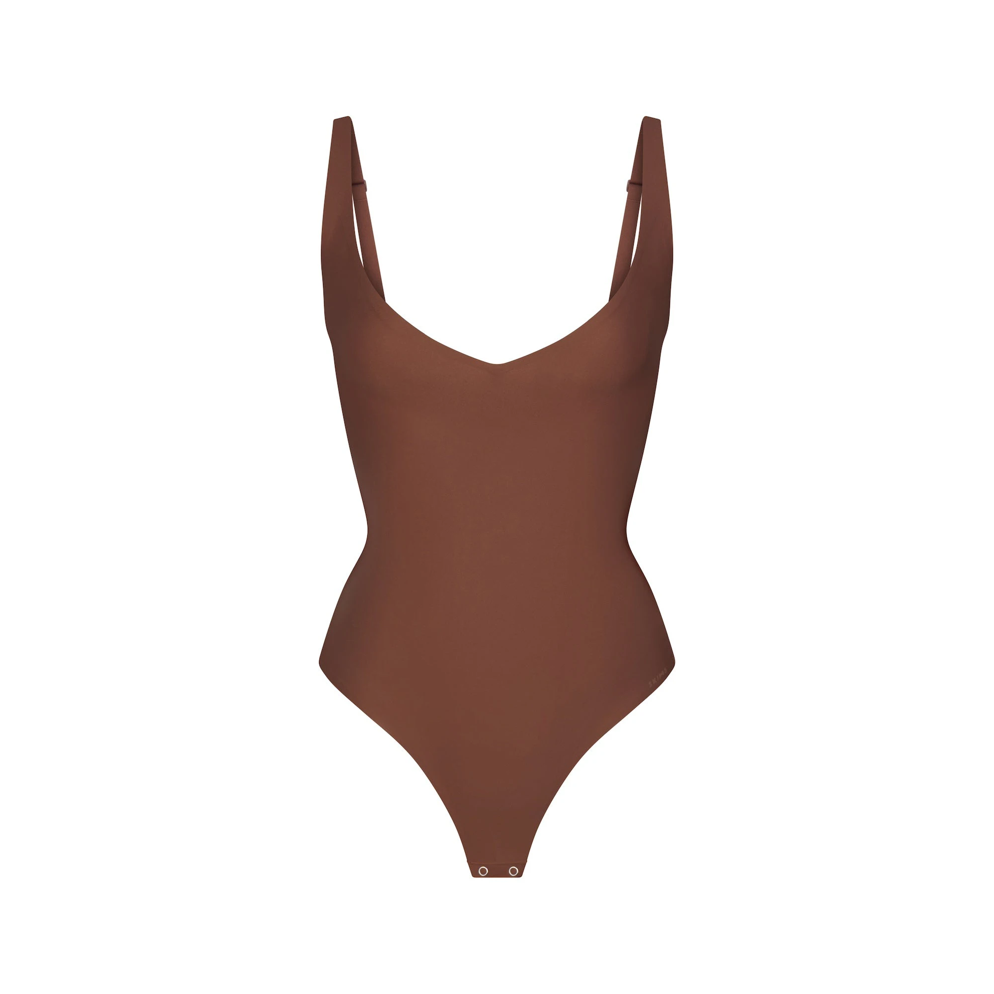 SKIMS BODY CORE SCULPT PLUNGE THONG BODYSUIT | JASPER (SHAPEWEAR BODYSUITS) FLAT ON A WHITE BACKGROUND | FLT