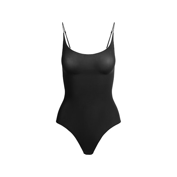 SHEER SEAMLESS THONG BODYSUIT | ONYX FLAT ON A WHITE BACKGROUND | FLT
