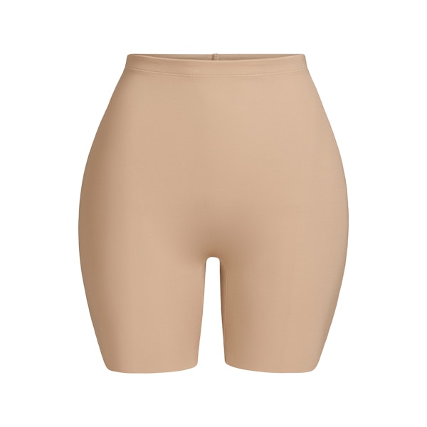 SKIMS BODY HIP ENHANCING MID THIGH SHORT | CLAY FLAT ON A WHITE BACKGROUND | FLT