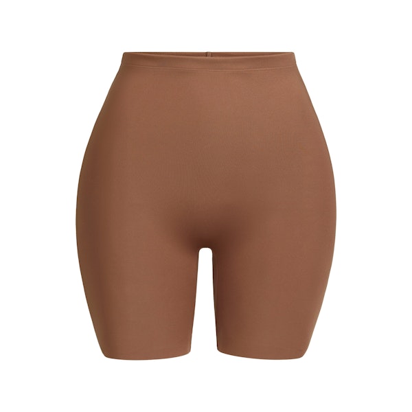 SKIMS BODY HIP ENHANCING MID THIGH SHORT | JASPER FLAT ON A WHITE BACKGROUND | FLT