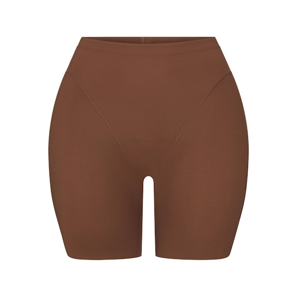 SKIMS BODY BUTT AND HIP ENHANCING MID THIGH SHORT | JASPER FLAT ON A WHITE BACKGROUND | FLT