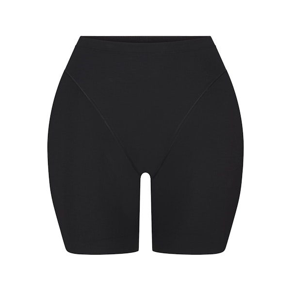 SKIMS BODY BUTT AND HIP ENHANCING MID THIGH SHORT | ONYX FLAT ON A WHITE BACKGROUND | FLT