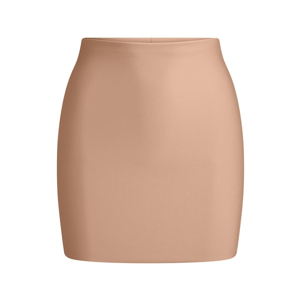 SKIMS BODY CORE SCULPT SKORT | SIENNA FLAT ON A WHITE BACKGROUND | FLT