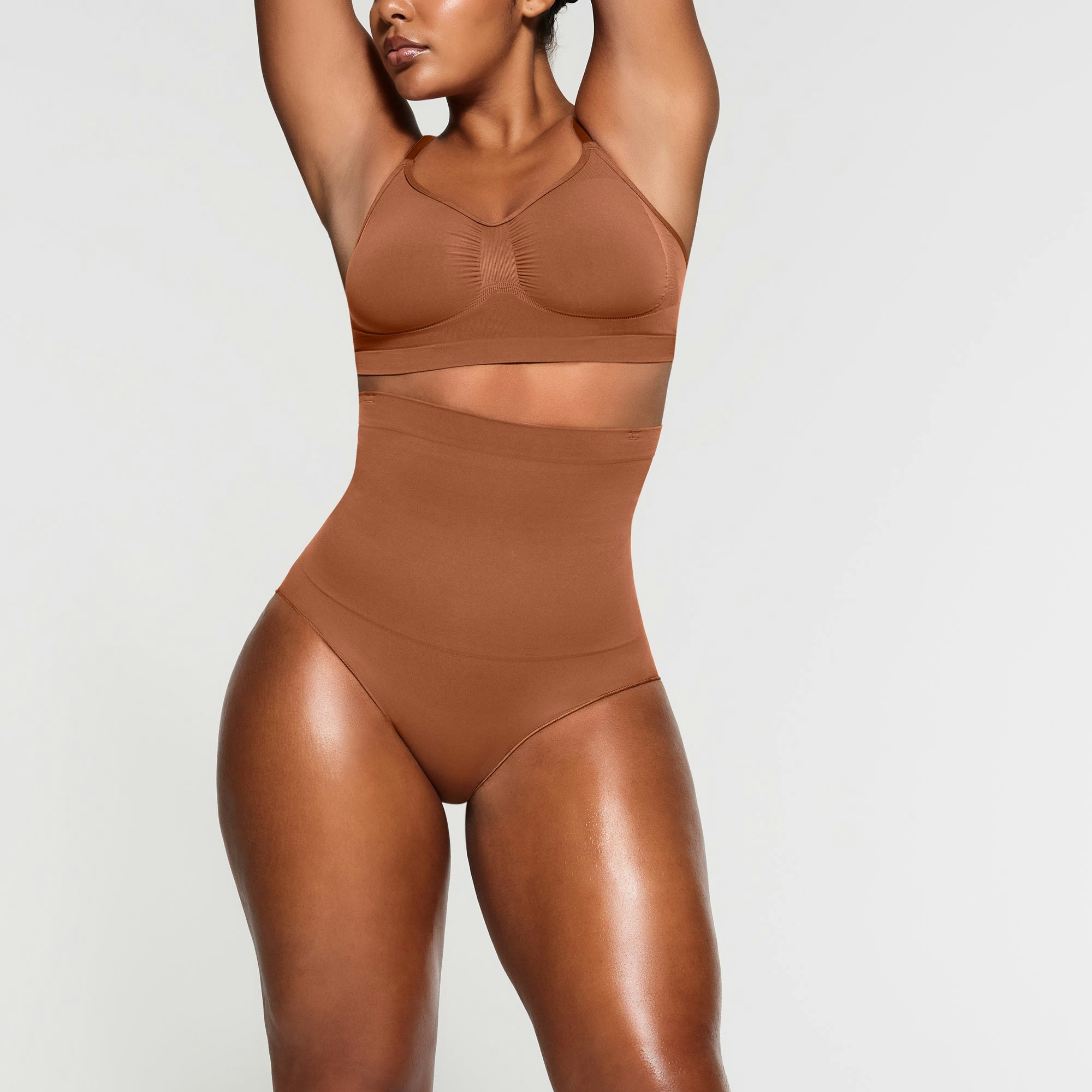 CORE CONTROL HIGH WAISTED BRIEF WORN BY A MODEL IN FRONT VIEW