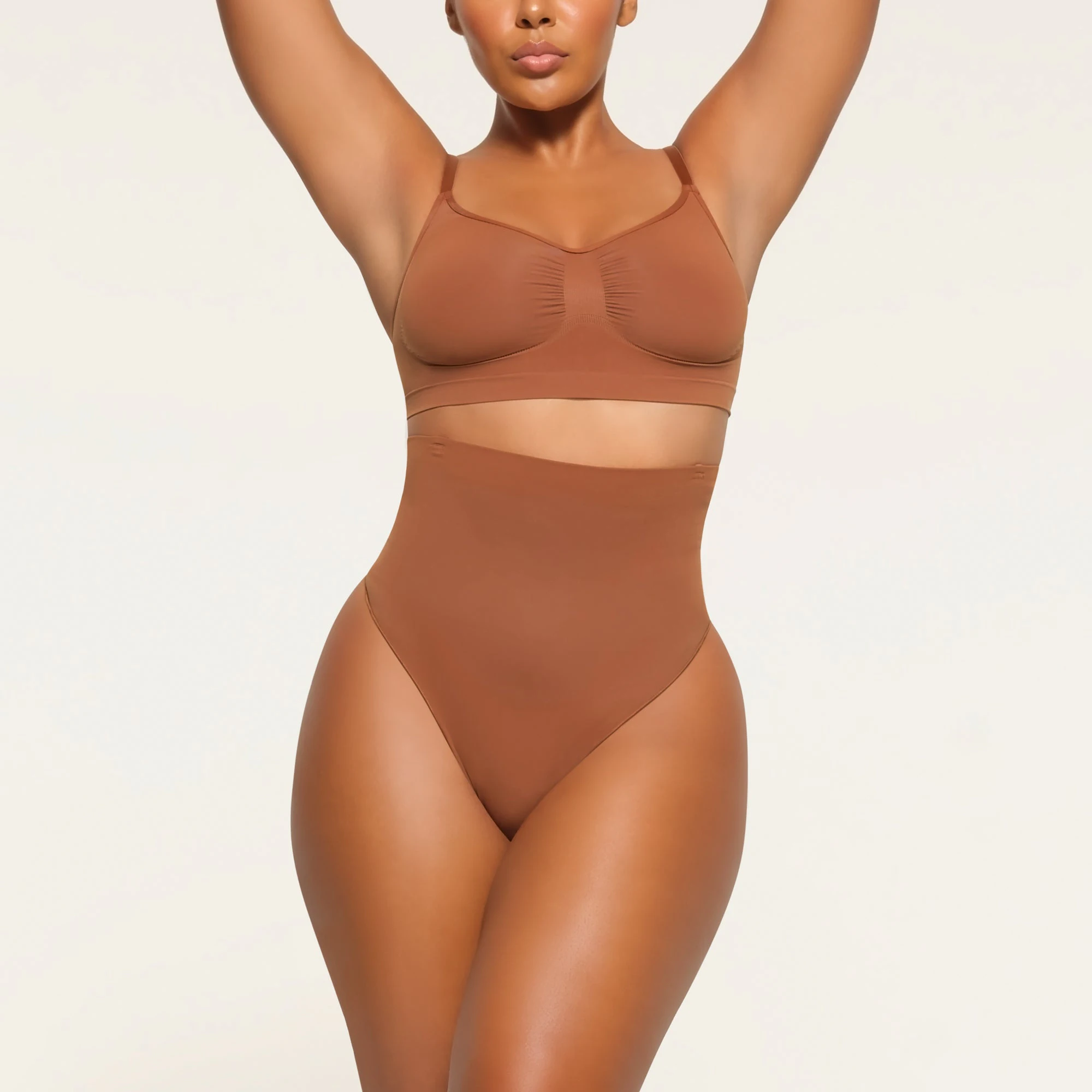 CORE CONTROL HIGH WAISTED THONG WORN BY A MODEL IN FRONT VIEW