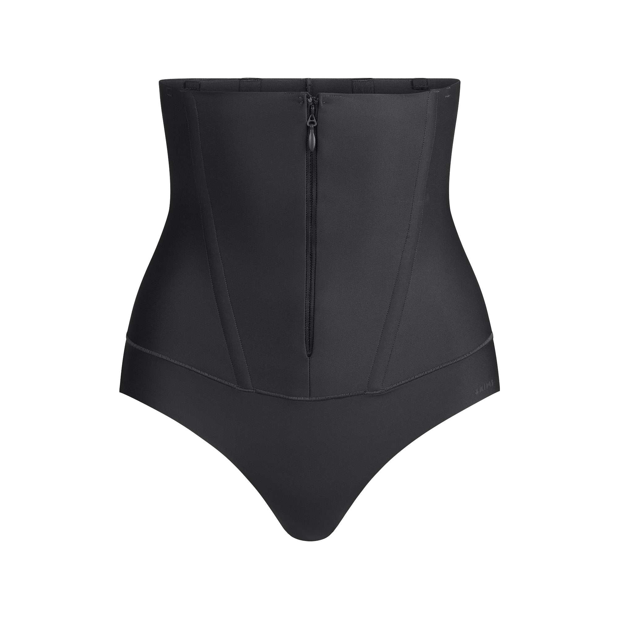 SKIMS BODY CORE SCULPT WAIST CINCHER THONG | ONYX FLAT ON A WHITE BACKGROUND | FLT