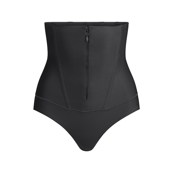 SKIMS BODY CORE SCULPT WAIST CINCHER THONG | ONYX FLAT ON A WHITE BACKGROUND | FLT