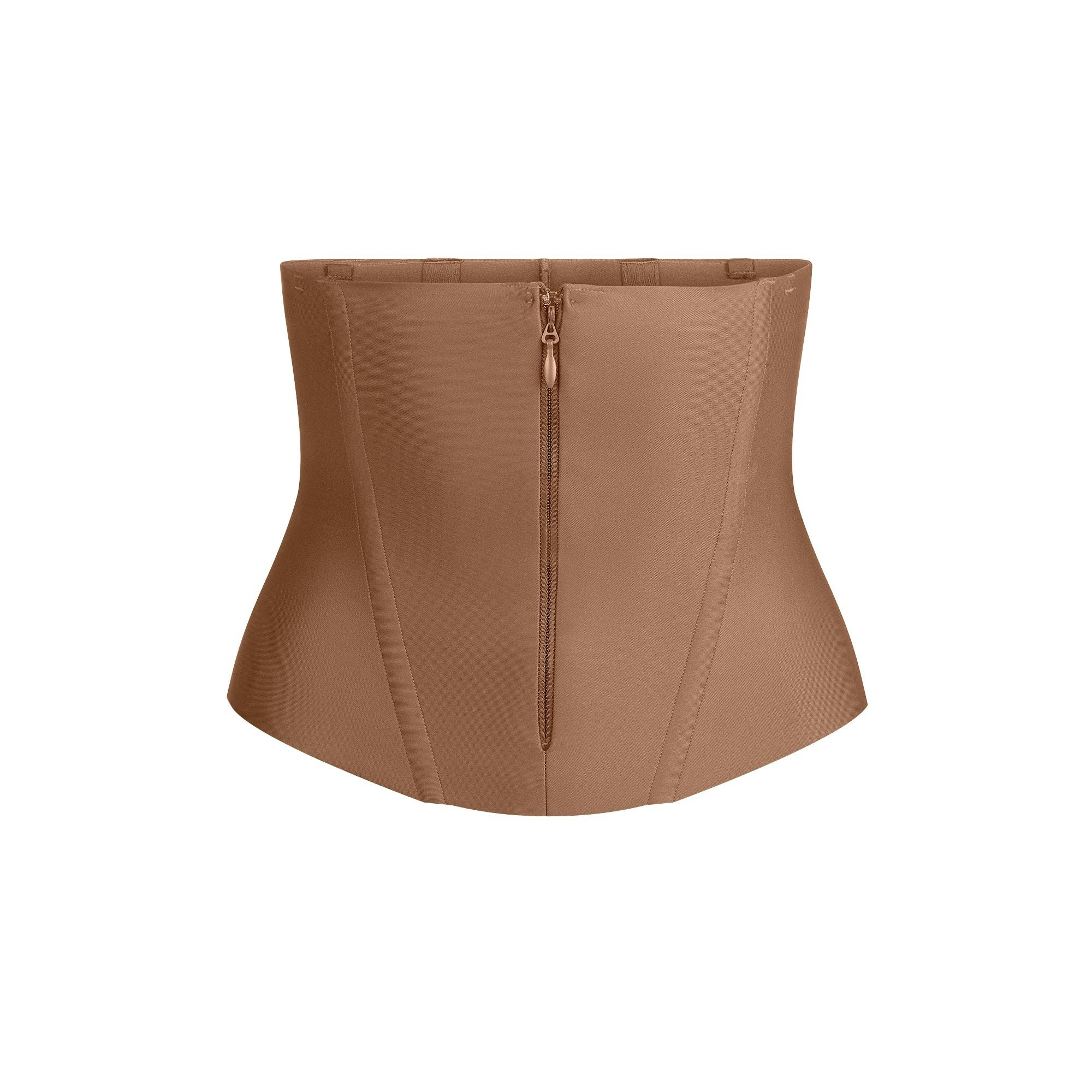 SKIMS BODY CORE SCULPT WAIST CINCHER | SIENNA FLAT ON A WHITE BACKGROUND | FLT
