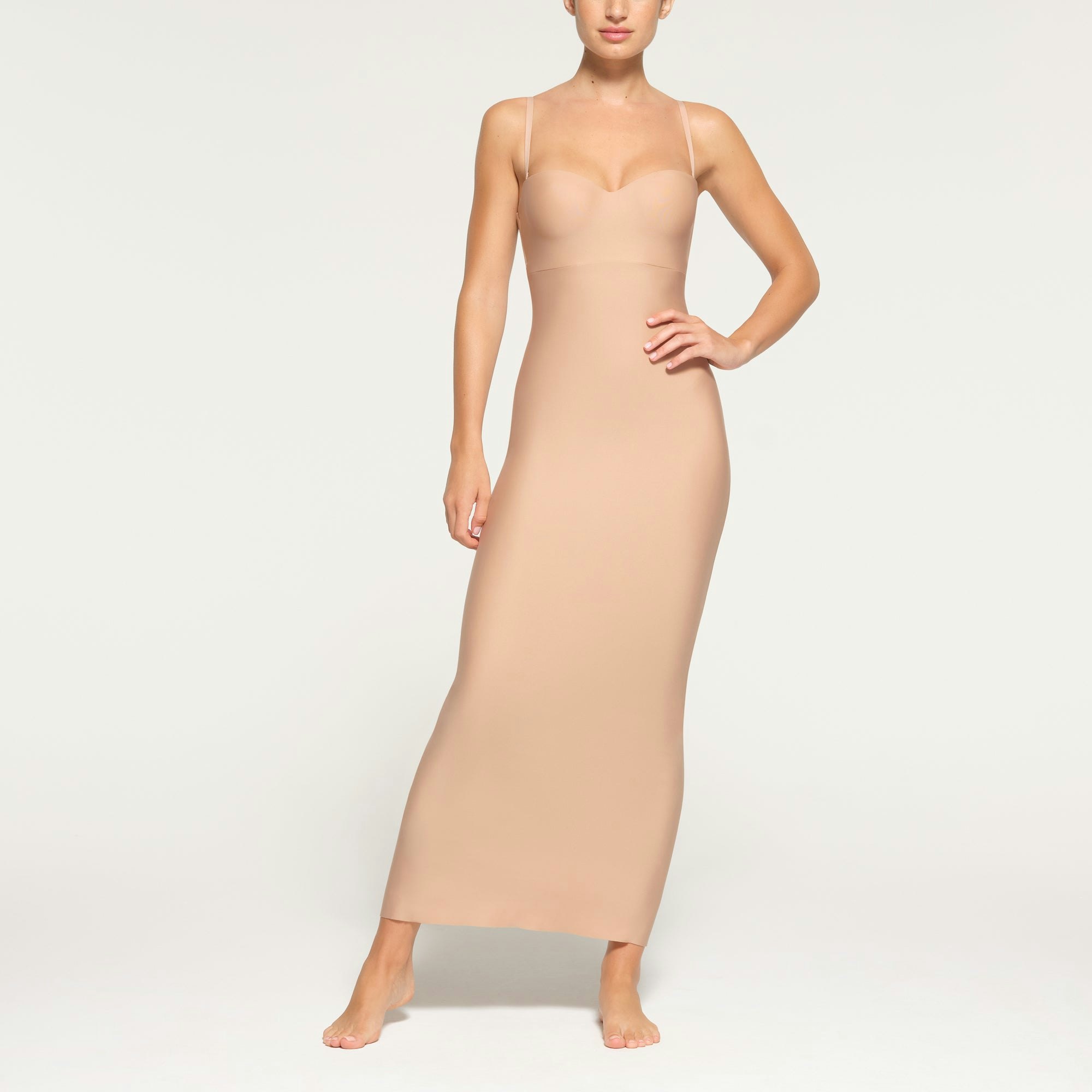 SKIMS BODY UNDERWIRE LONG DRESS WORN BY A MODEL IN FRONT VIEW