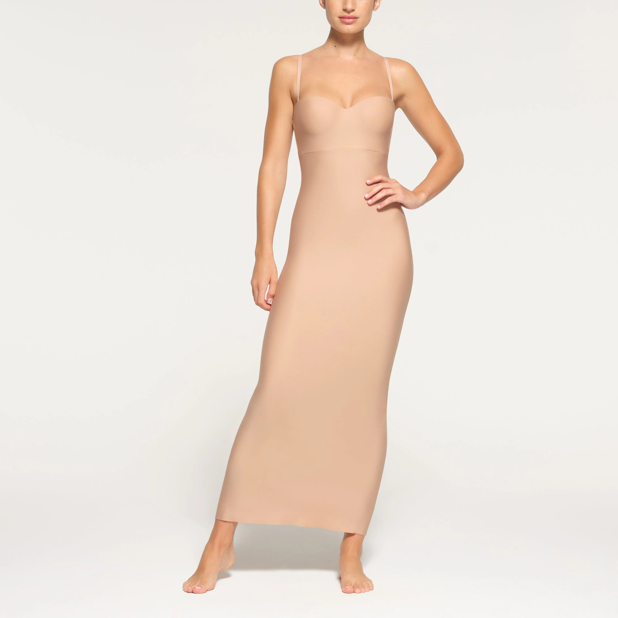 SKIMS BODY UNDERWIRE LONG DRESS WORN BY A MODEL IN FRONT VIEW