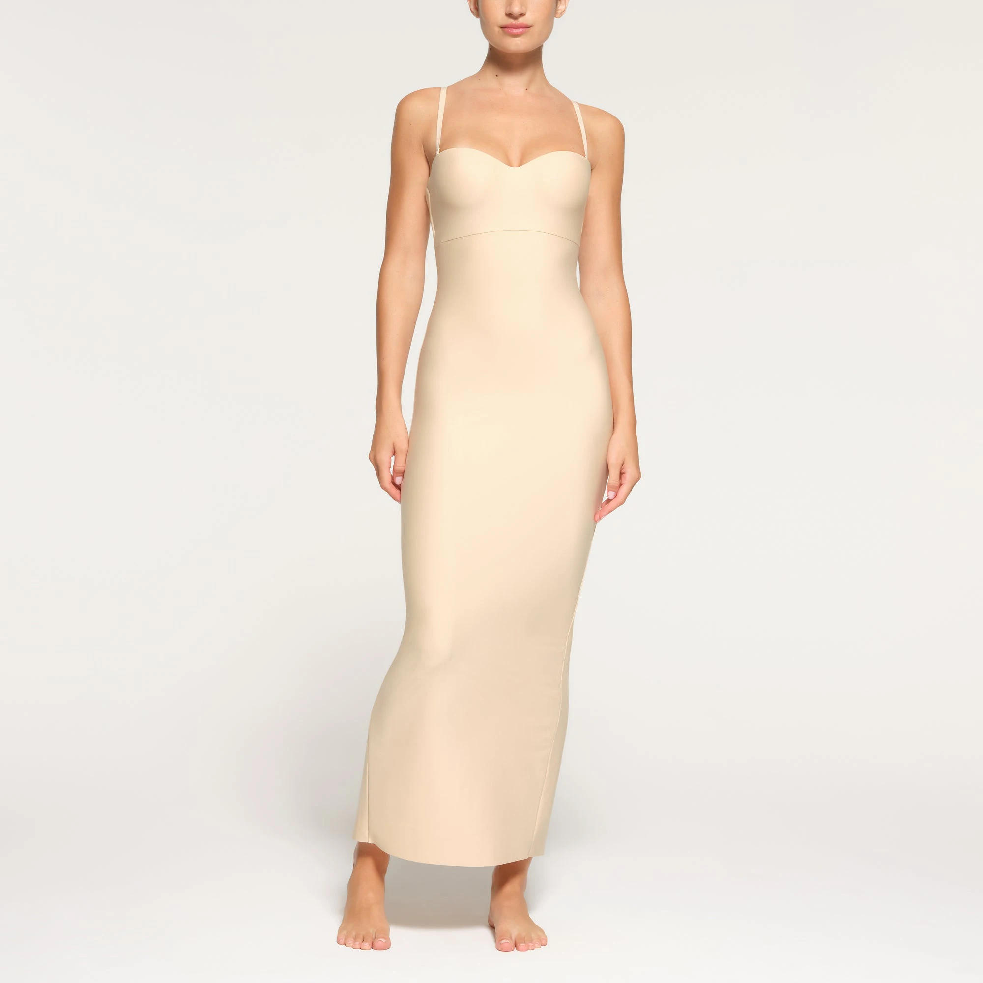 SKIMS BODY UNDERWIRE LONG DRESS WORN BY A MODEL IN FRONT VIEW