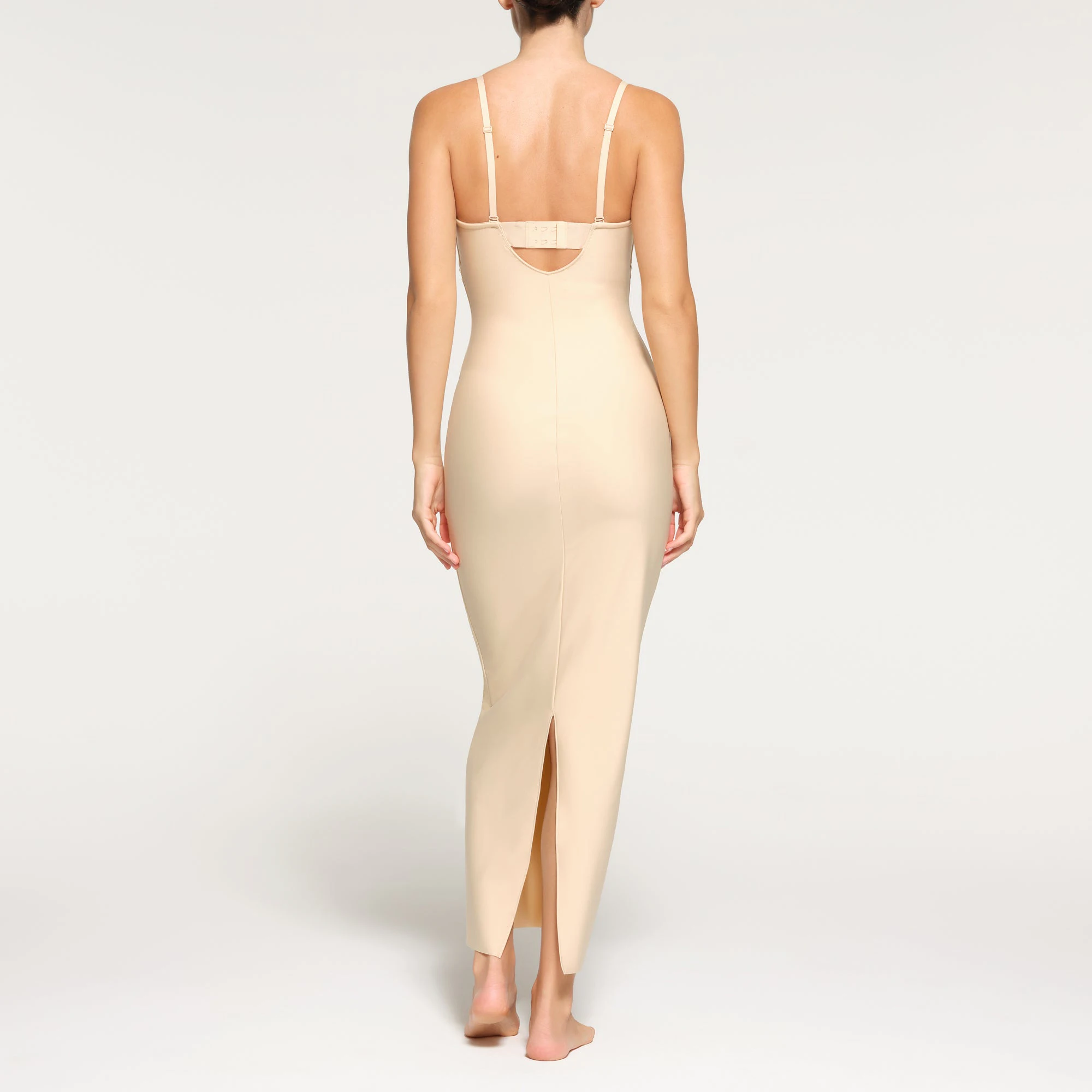 SKIMS BODY UNDERWIRE LONG DRESS ON A MODEL BACK VIEW