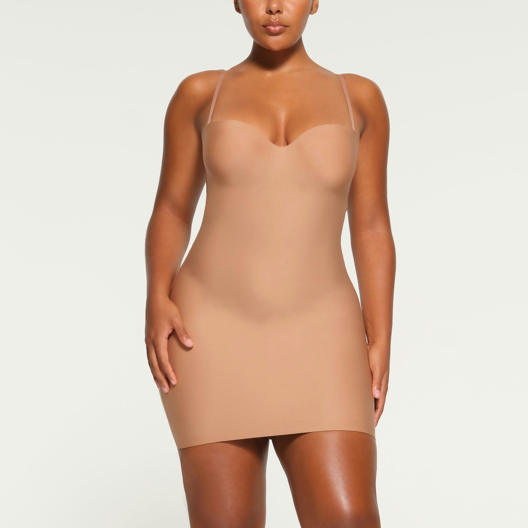 SKIMS BODY UNDERWIRE SLIP DRESS WORN BY A MODEL IN FRONT VIEW
