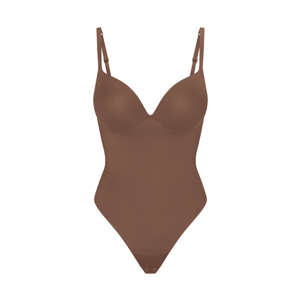 SKIMS ULTIMATE BODY PUSH-UP THONG BODYSUIT | JASPER FLAT ON A WHITE BACKGROUND | FLT | FLT
