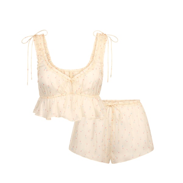 SKIMS ROMANCE BABYDOLL AND SHORT SET | BUTTER VINTAGE ROSE PRINT FLAT ON A WHITE BACKGROUND | FLT