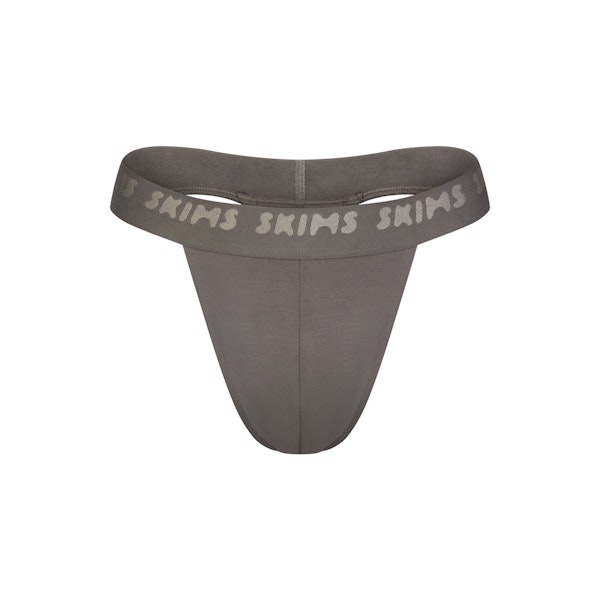 SKIMS STRETCH MENS THONG | GUNMETAL FLAT ON A WHITE BACKGROUND | FLT @ | FOCUS: 0.0, 1.0, 0.9