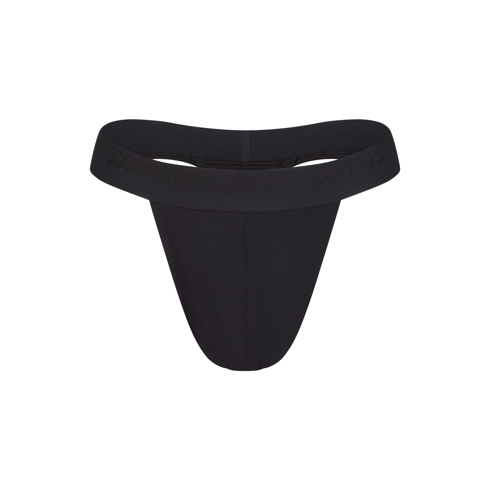 SKIMS STRETCH MENS THONG | OBSIDIAN FLAT ON A WHITE BACKGROUND