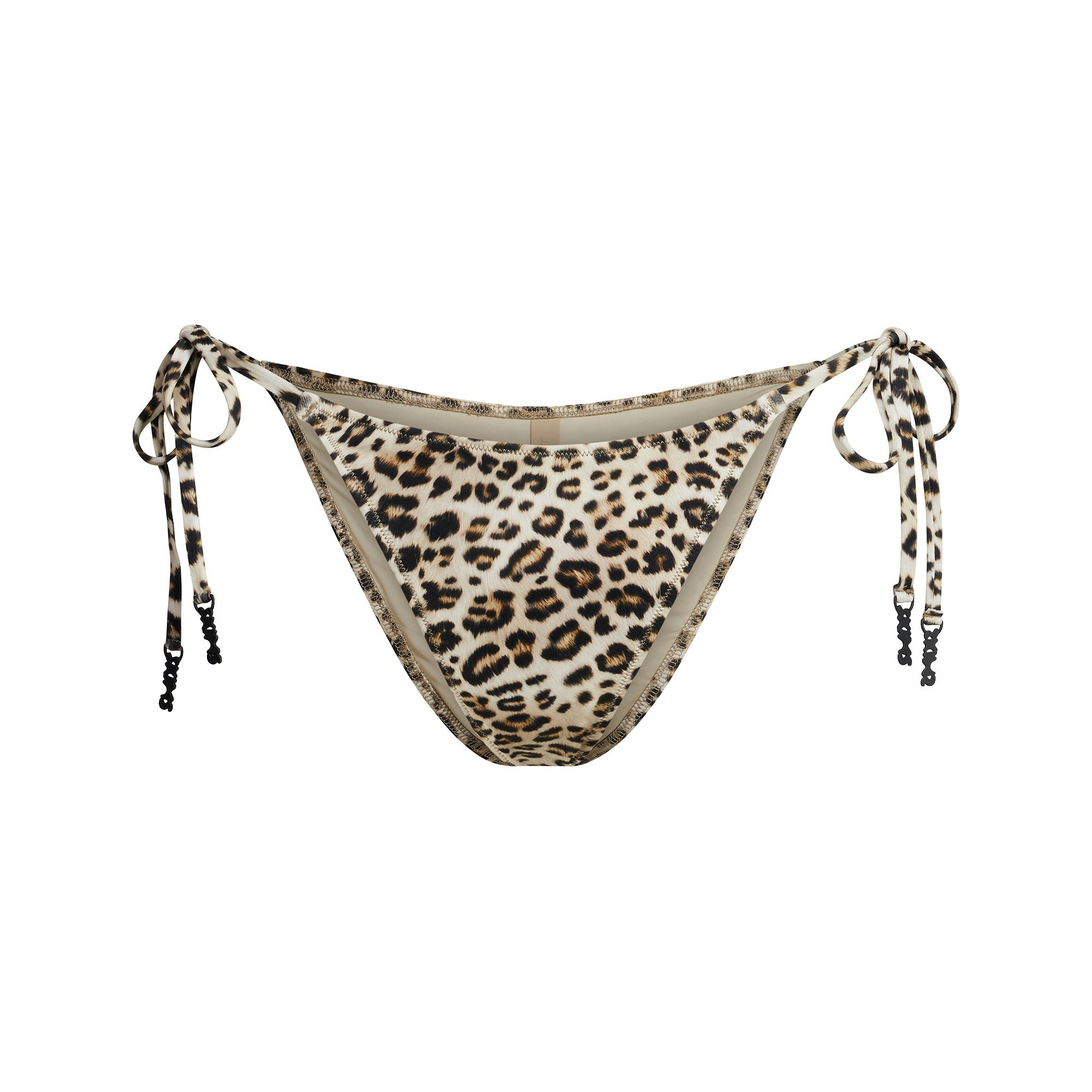 SIGNATURE SWIM DIPPED TIE BIKINI BOTTOM | CHAMPAGNE LEOPARD PRINT FLAT ON A WHITE BACKGROUND | FLT