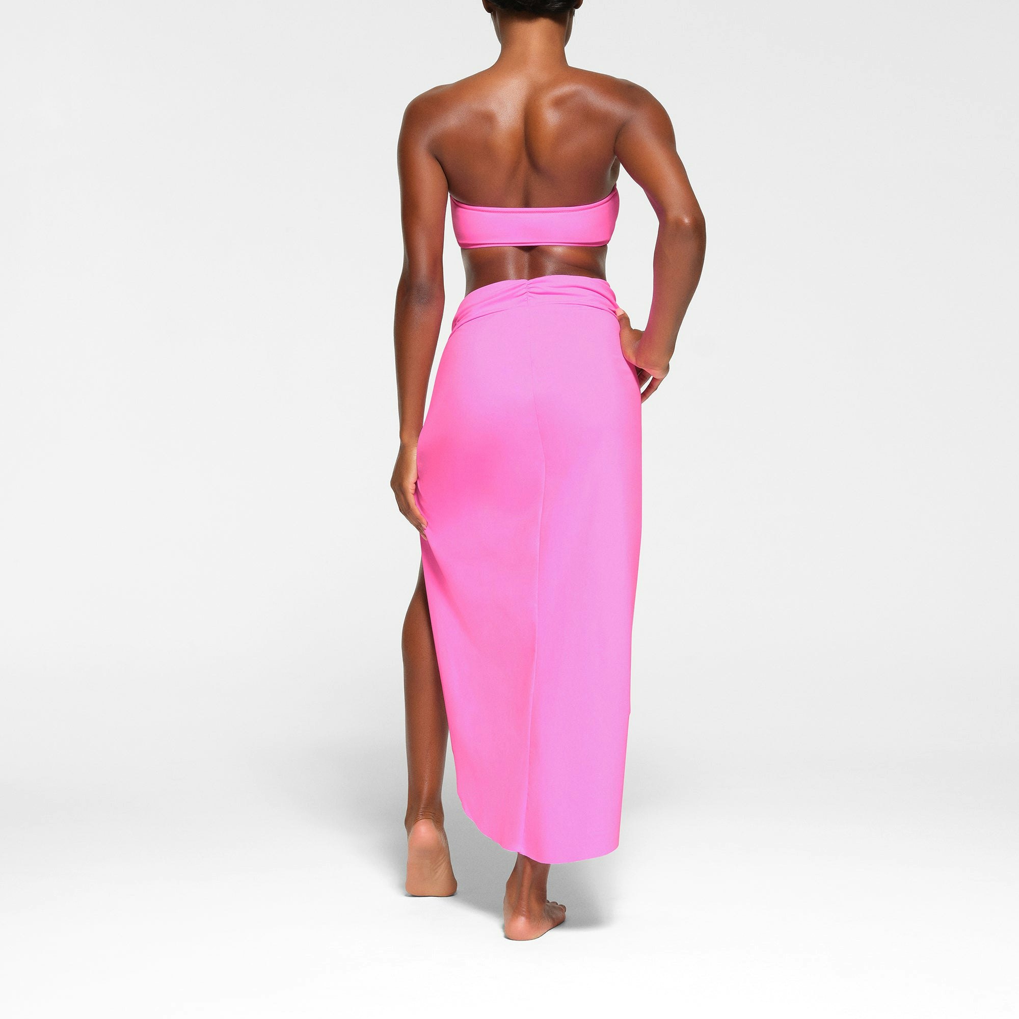 SWIM BANDEAU BIKINI TOP WORN BY A MODEL IN BACK VIEW