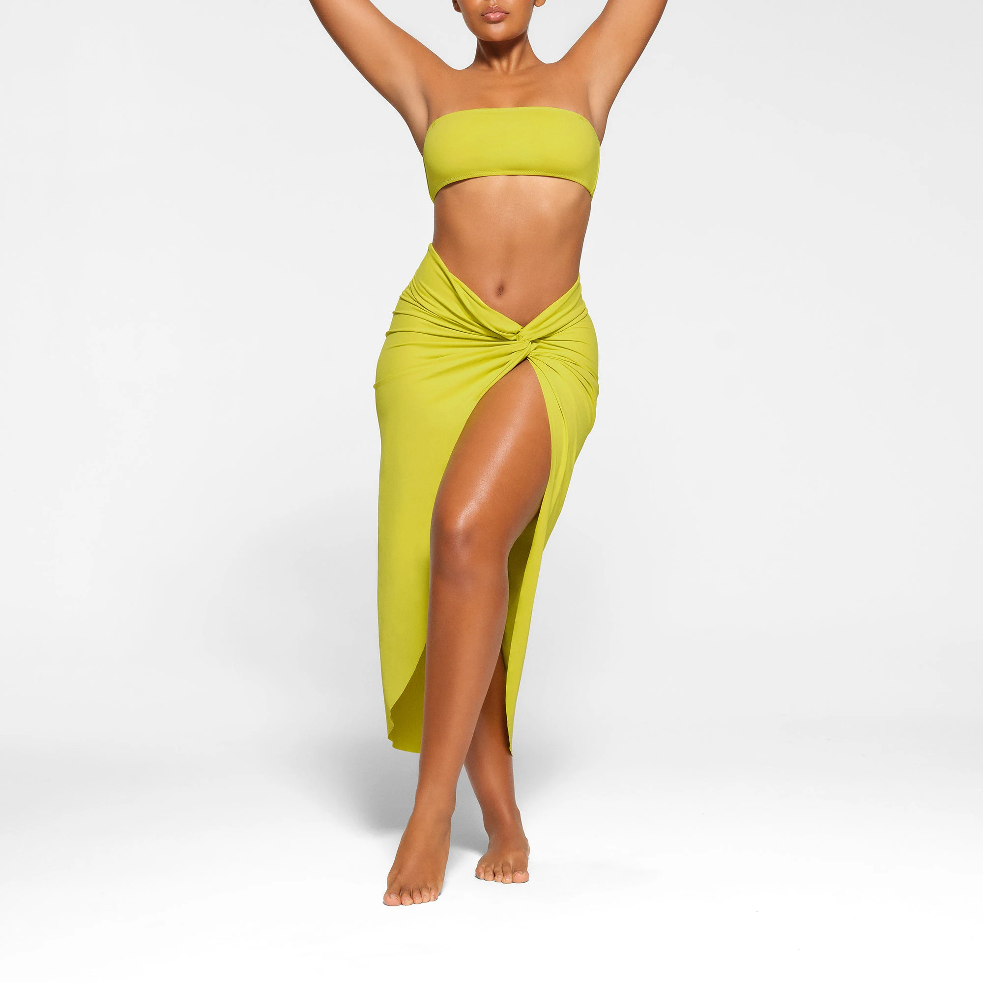 SWIM SARONG SKIRT WORN BY A MODEL IN FRONT VIEW